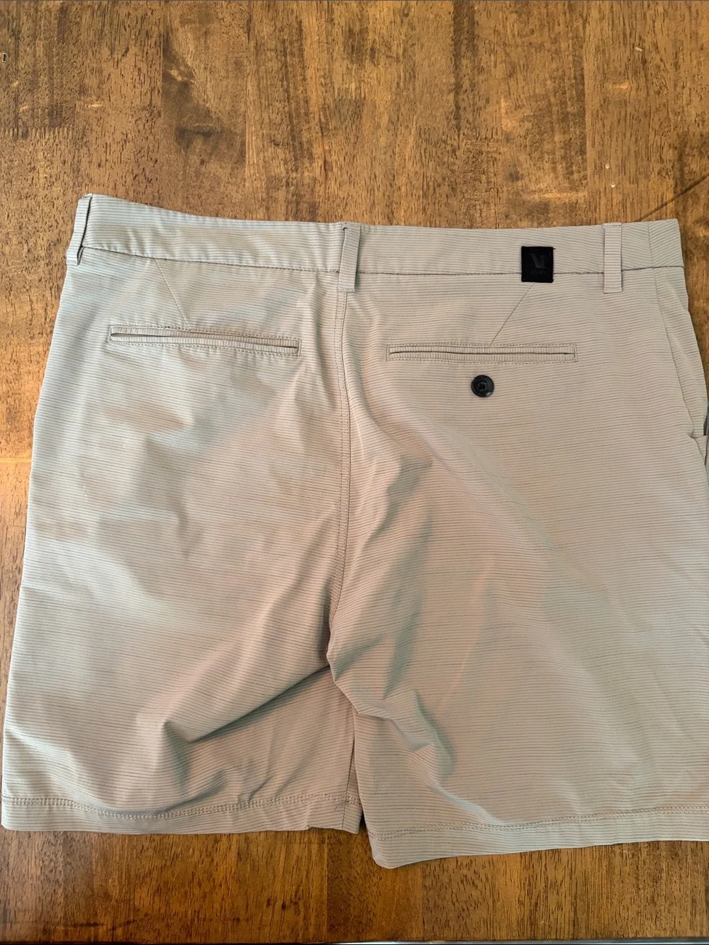 Vuori Men's Flat-Front Performance Shorts in Light Taupe